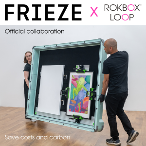 Two fine art handlers carry ROKBOX LiteHD crate